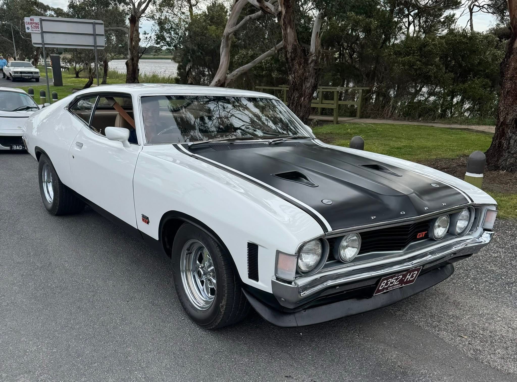 Chrysler Valiant cream sedan at show